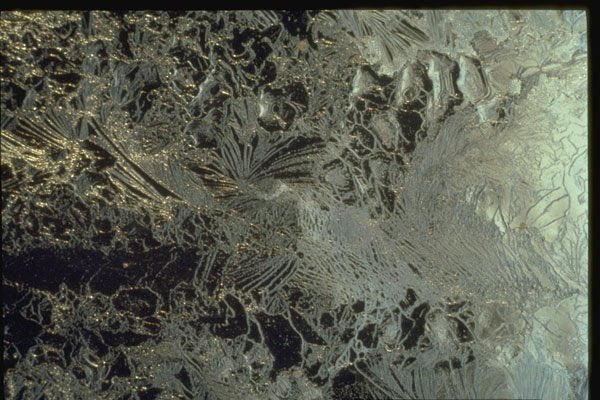 350006 Melting Ice With Golden Glints On Black A4 Photo Print