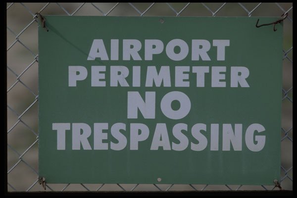 363023 Airport Perimeter No Trespassing A4 Photo Print