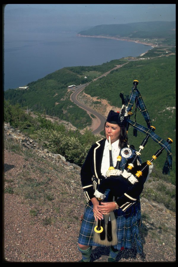 365063 Highland Piper In Nova Scotian Tartan A4 Photo Print