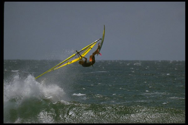 370005 Windsurfer Flying Off Wave A4 Photo Print
