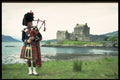 376038 Highland Piper And Castle, Scotland A4 Photo Print