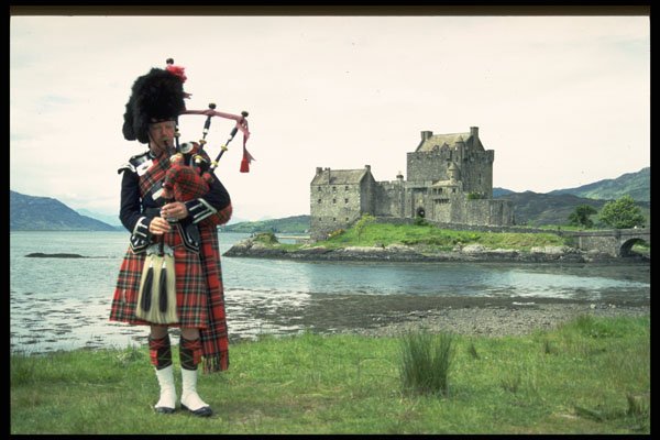 376038 Highland Piper And Castle, Scotland A4 Photo Print