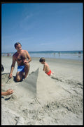 384001 Father And Son Building A Sandcastle A4 Photo Print