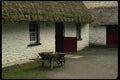 385012 Wheelbarrow In The Yard A4 Photo Print