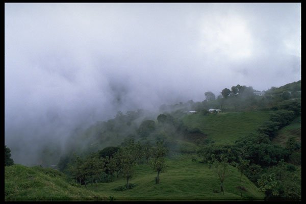 395022 Mist Over A Mountain Village A4 Photo Print