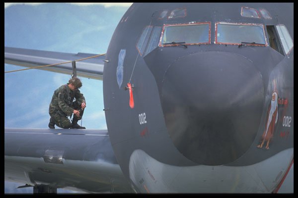 396075 Last minute Preparation For Flight A4 Photo Print