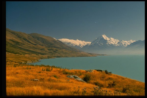 405099 Mountains And Shoreline, Lake Pukaki, New Zealand A4 Photo Print