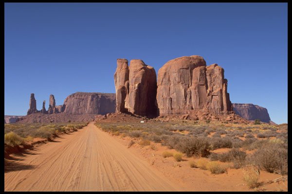 407029 Camel, Mitchell Mesa And Three Sisters A4 Photo Print