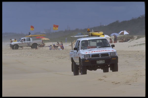411042 Lifeguards, Sunrise Beach, Queensland A4 Photo Print