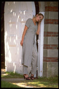 420024 Agnes Standing At A Gate In A Long Pants Suit A4 Photo Print