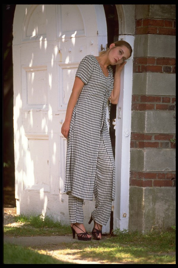420024 Agnes Standing At A Gate In A Long Pants Suit A4 Photo Print