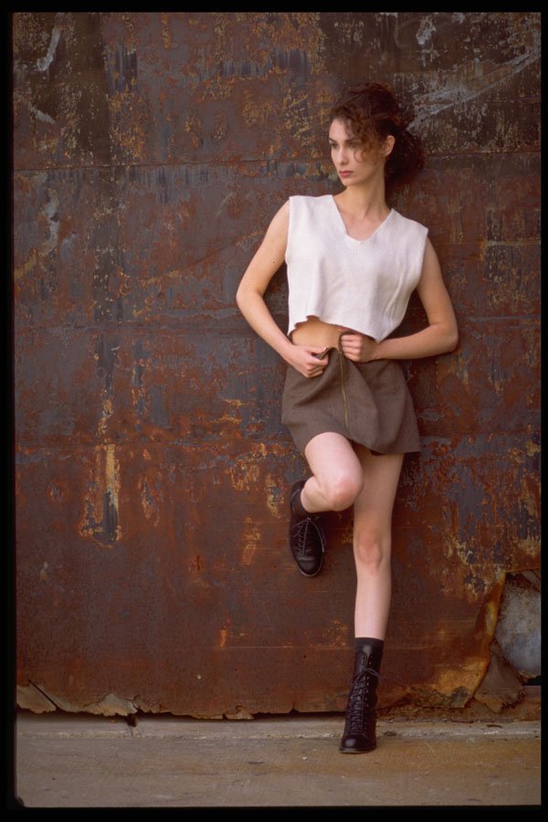420075 Casual Pose, Long Legs And A Rustic Setting A4 Photo Print