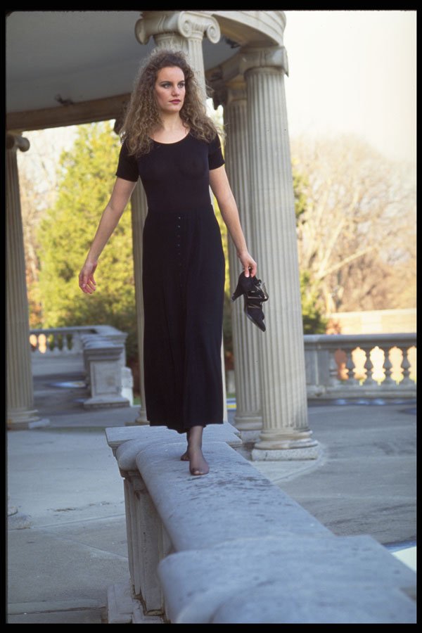 420082 Beth Walking On A Granite Railing A4 Photo Print