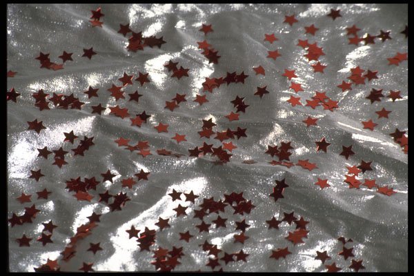 421054 Star Confetti On Silver Lame A4 Photo Print