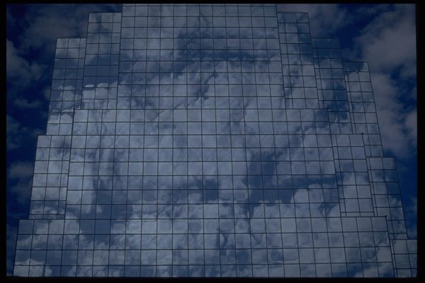 421082 Clouds Reflected In Building A4 Photo Print