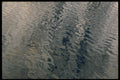 423094 Reflection Of Granite Cliff A4 Photo Print
