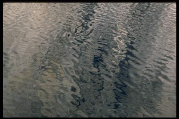 423094 Reflection Of Granite Cliff A4 Photo Print