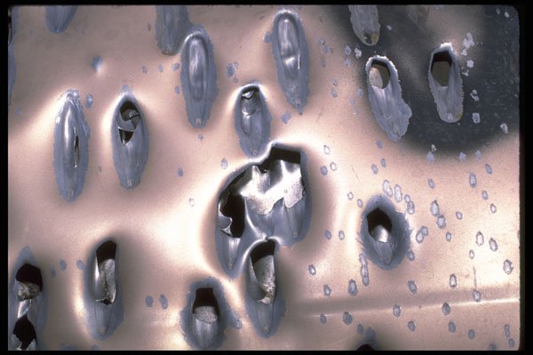 428092 Effect Of Impact Of Various Rounds On Car Truck Lid A4 Photo Print