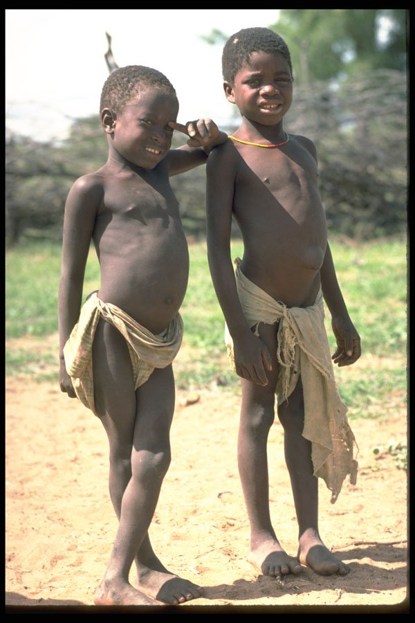 429035 Young Boys At Their Rual Family Compound In Kuene, Angola A4 Photo Print