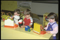 429079 Three Children Playing With Toys A4 Photo Print