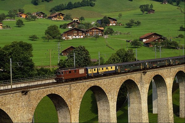 439071 Passenger Train Crosses High Bridge In Frutigen A4 Photo Print