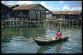 446059 Lady In Canoe, Hamadi, Jayapura A4 Photo Print
