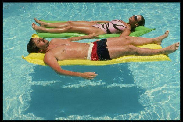 448067 Suntanning At Swimming Pool, Fort Myers Beach A4 Photo Print