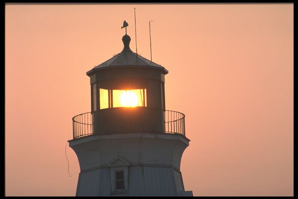 460056 Sun Through Lighthouse A4 Photo Print