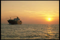 460074 Container Ship At Sunset A4 Photo Print
