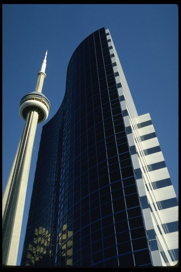 462009 Towers Against The Sky A4 Photo Print