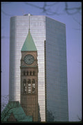 462012 Modern Building And Clock A4 Photo Print