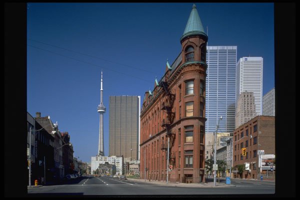 462052 Flat Iron Building And CN Tower A4 Photo Print