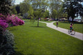 463055 Young Cyclists Enjoy Azalea Garden A4 Photo Print