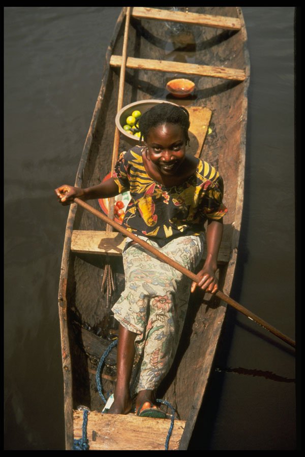 464021 Lady Trader In Canoe, Nigeria Swamplands A4 Photo Print