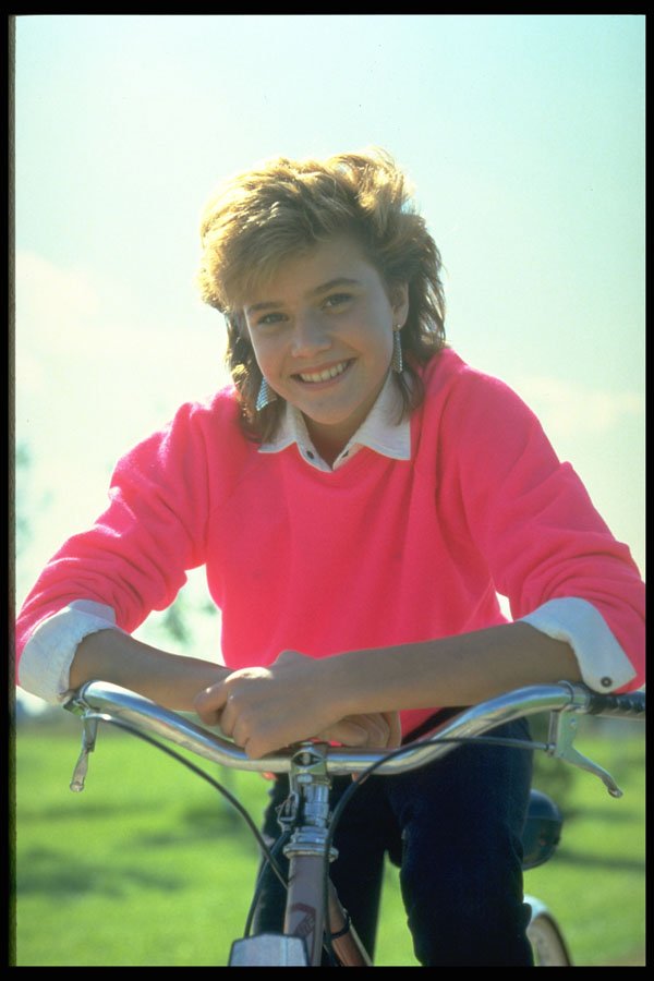 464030 Young Woman On Bike A4 Photo Print