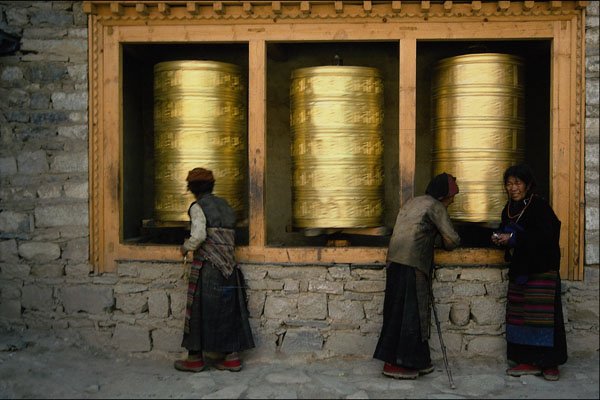 467096 Three Prayer Wheels And Pilgrims, Sakya Monastery, Tibet A4 Photo Print