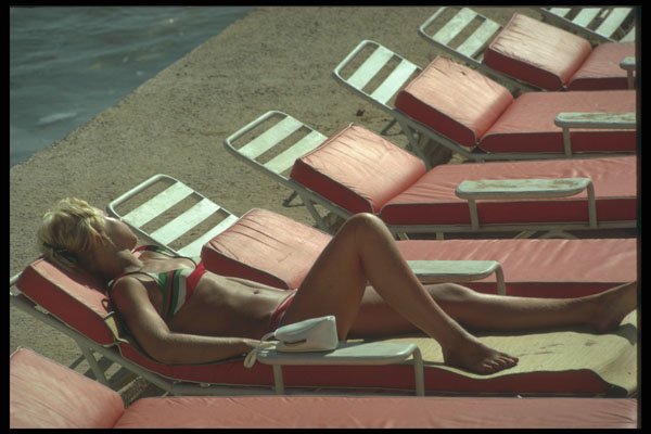 469022 Sunbather On Beach, Barbados A4 Photo Print