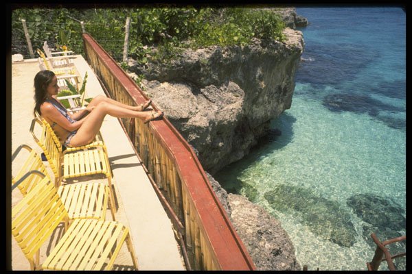 469098 Girl On Balcony In Jamaica A4 Photo Print