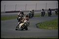 474055 A Pack Of Formula 2 Bikes Attacks A Tricky Hairpin Turn A4 Photo Print