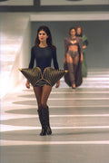 475010 Female In Outfit With Large Cone Shapes On Hips A4 Photo Print