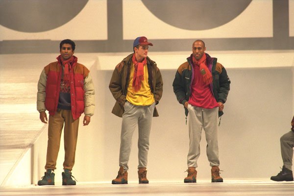 475036 Three Males In Casual Boots, Jeans And Padded Jackets A4 Photo Print
