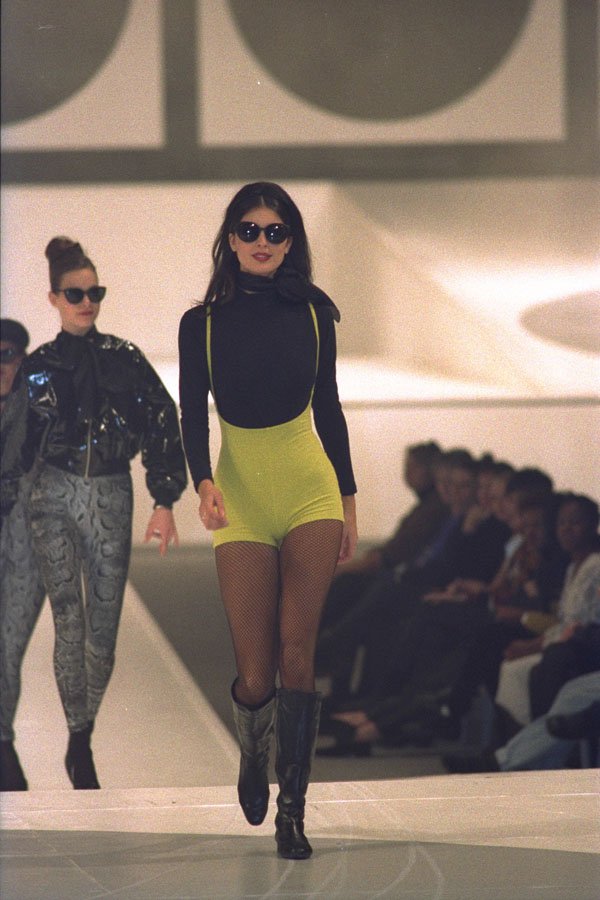 475044 Female In Black Boots And Long sleeved Top With Yellow Shorts A4 Photo Print
