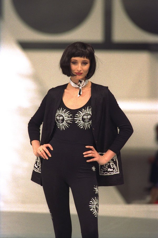 475049 Female In Black Bodysuit, Waistcoat With Sun God Patterns A4 Photo Print