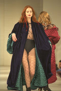 475069 Female In Long Black Coat With Green Quilt Lining A4 Photo Print