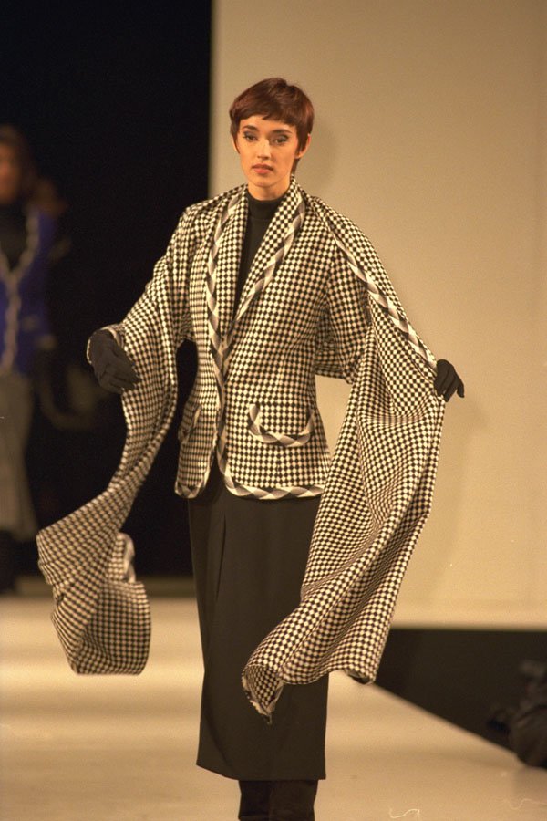 475084 Female Wearing Black And White Check Jacket And Long Scarf A4 Photo Print