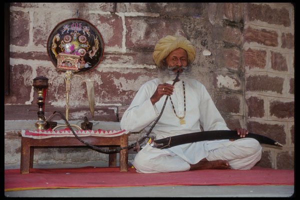 481024 Man Smoking Water Pipe At Jodphur A4 Photo Print