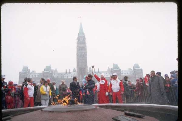 484010 Olympic Torch Bearer On Parliament Hill, Ottawa A4 Photo Print