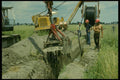 489046 Shovel Working Ahead Of Cable Layer A4 Photo Print