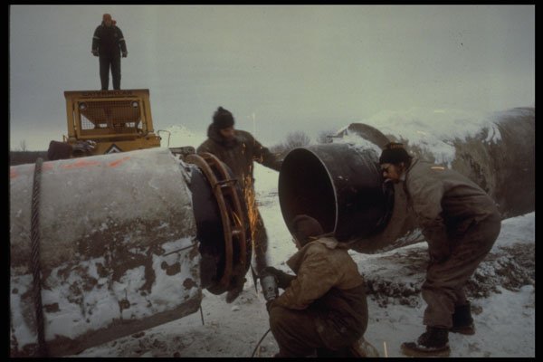 489074 Men Working On Pipeline In Northern Canada A4 Photo Print