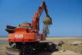 489083 Extracting Sand For Construction From Southport Beach A4 Photo Print